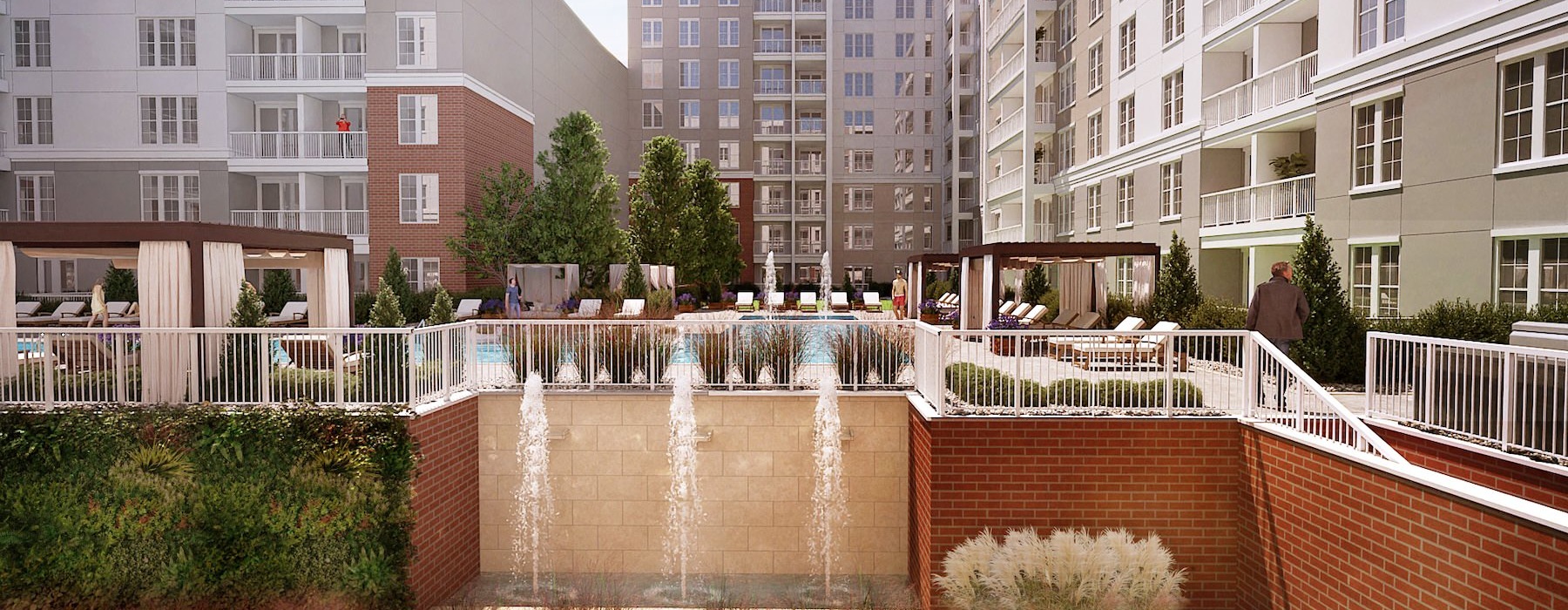 buildings with a waterfall and people