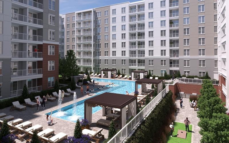 a courtyard with a pool and people and buildings around it