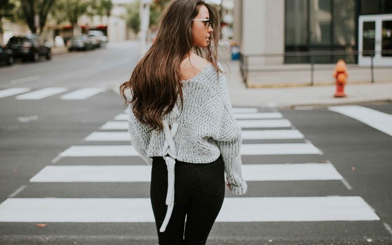 a person walking in a crosswalk